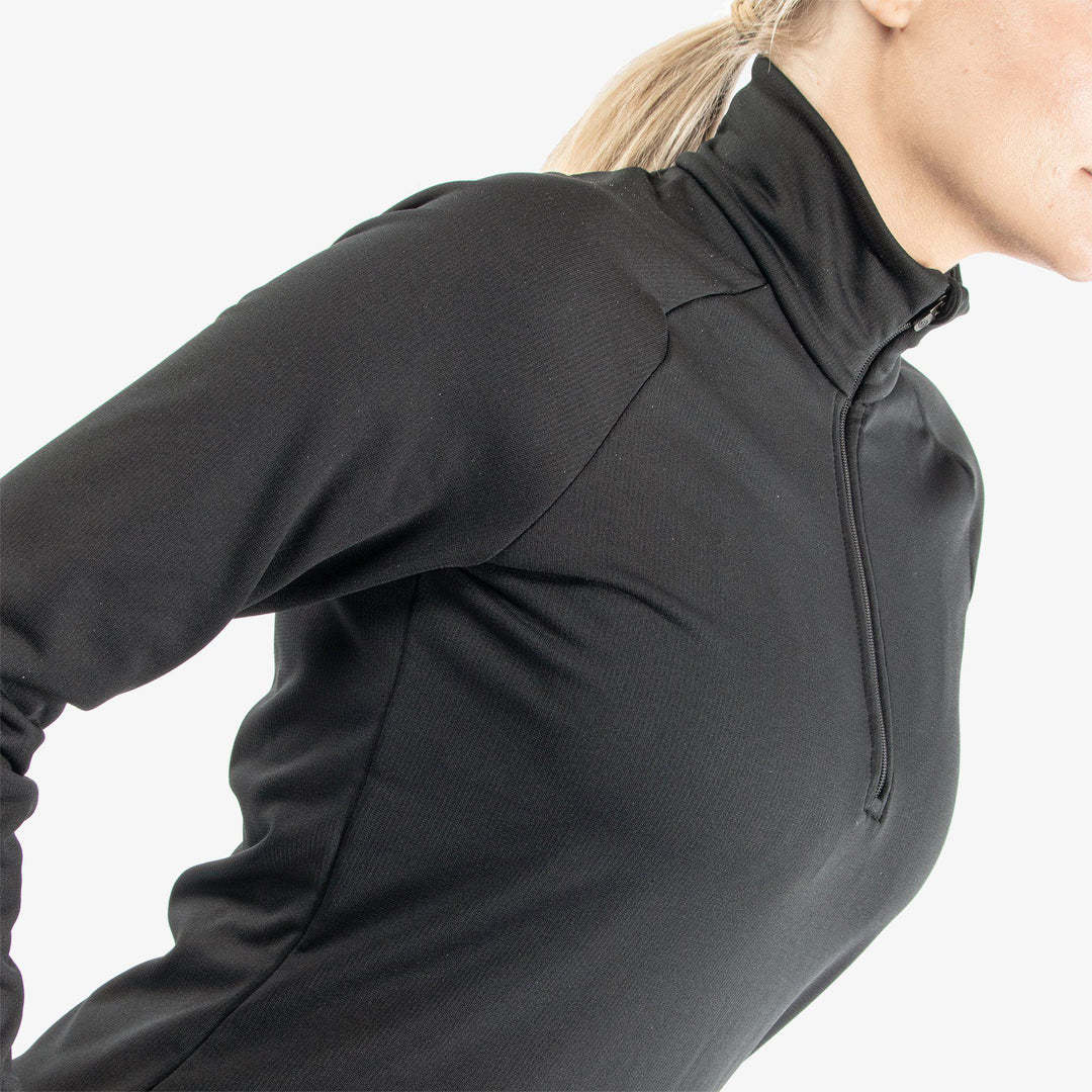 Dolly is a Insulating golf mid layer for Women in the color Black(3)