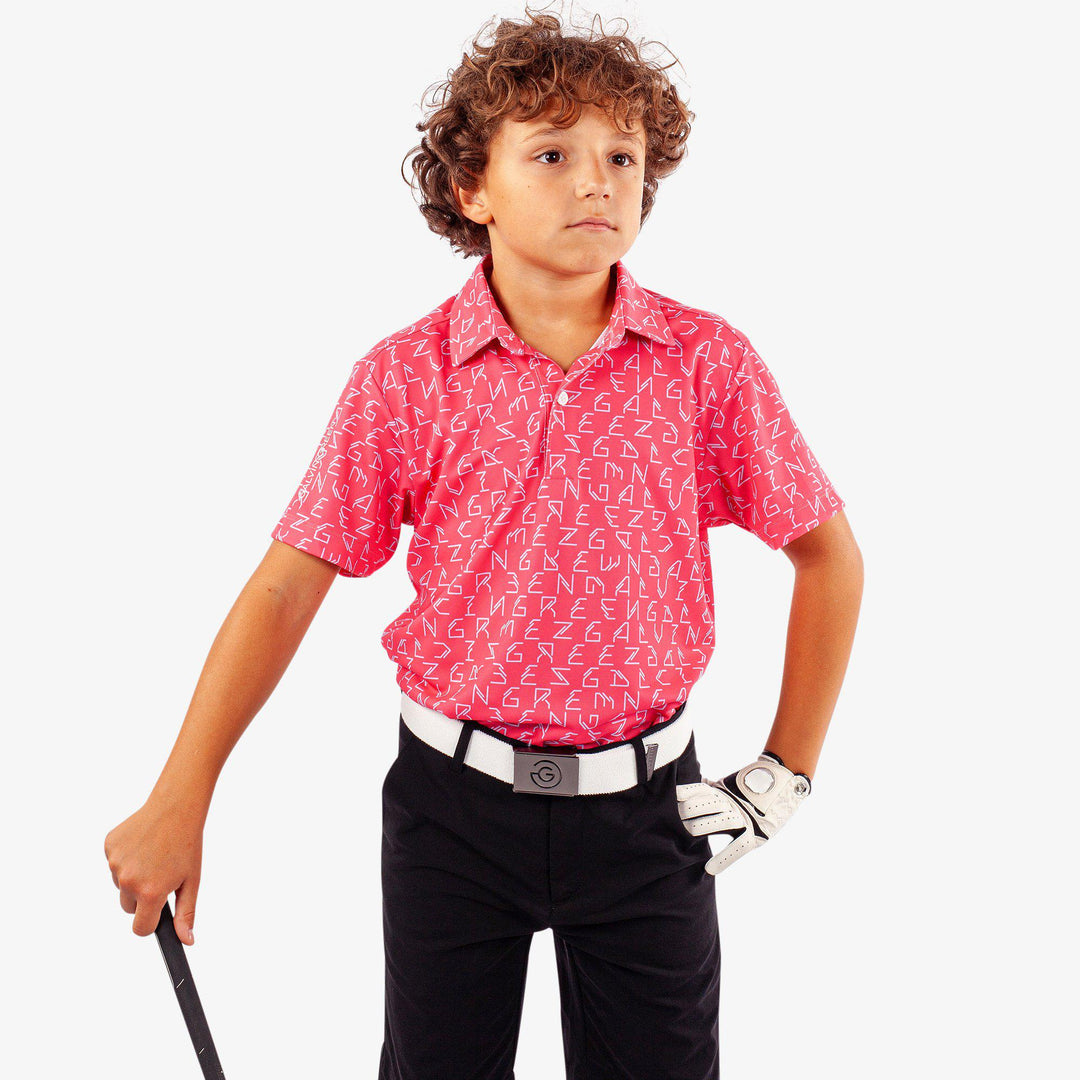 Rickie is a Breathable short sleeve golf shirt for Juniors in the color Camelia Rose(1)