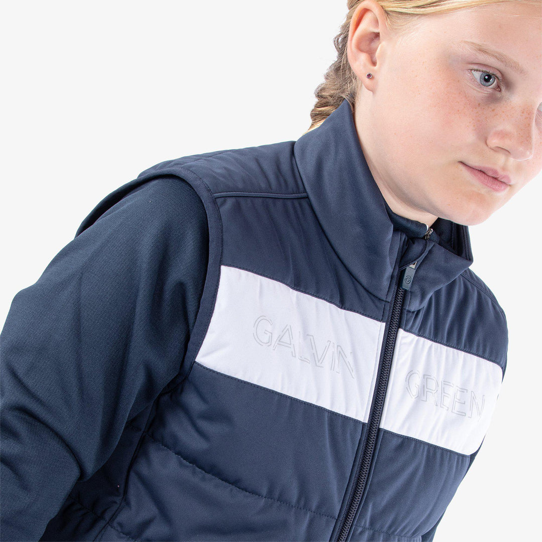 Ronie is a Windproof and water repellent golf vest for Juniors in the color Navy/White(3)