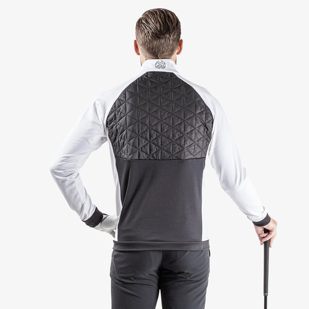 Dexter is a Insulating golf mid layer for Men in the color Black/White(6)