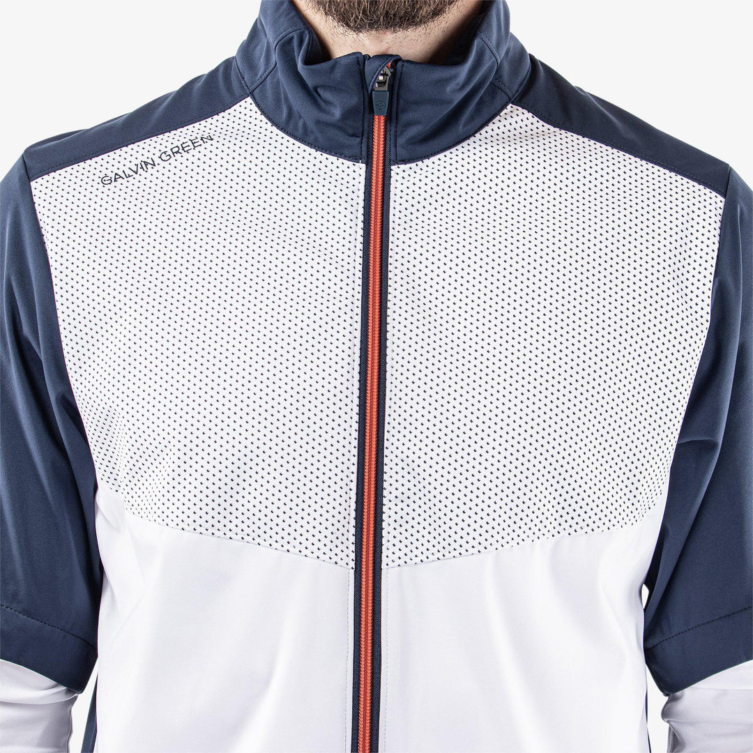 Livingston is a Windproof and water repellent short sleeve golf jacket for  in the color White/Navy/Orange(3)
