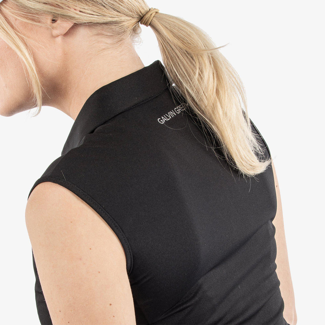Meg is a Breathable short sleeve golf shirt for Women in the color Black/White(7)