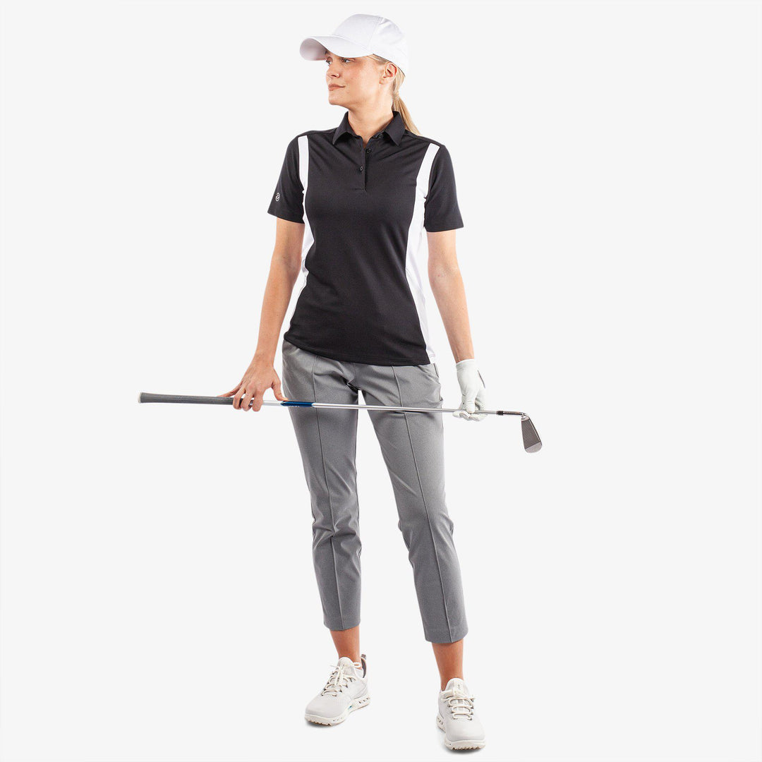 Melanie is a Breathable short sleeve golf shirt for Women in the color Black/White/Cool Grey(2)