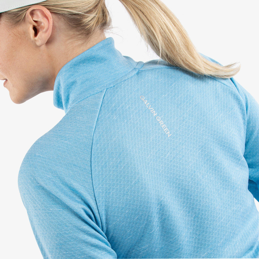 Diora is a Insulating golf mid layer for Women in the color Alaskan Blue Melange(5)