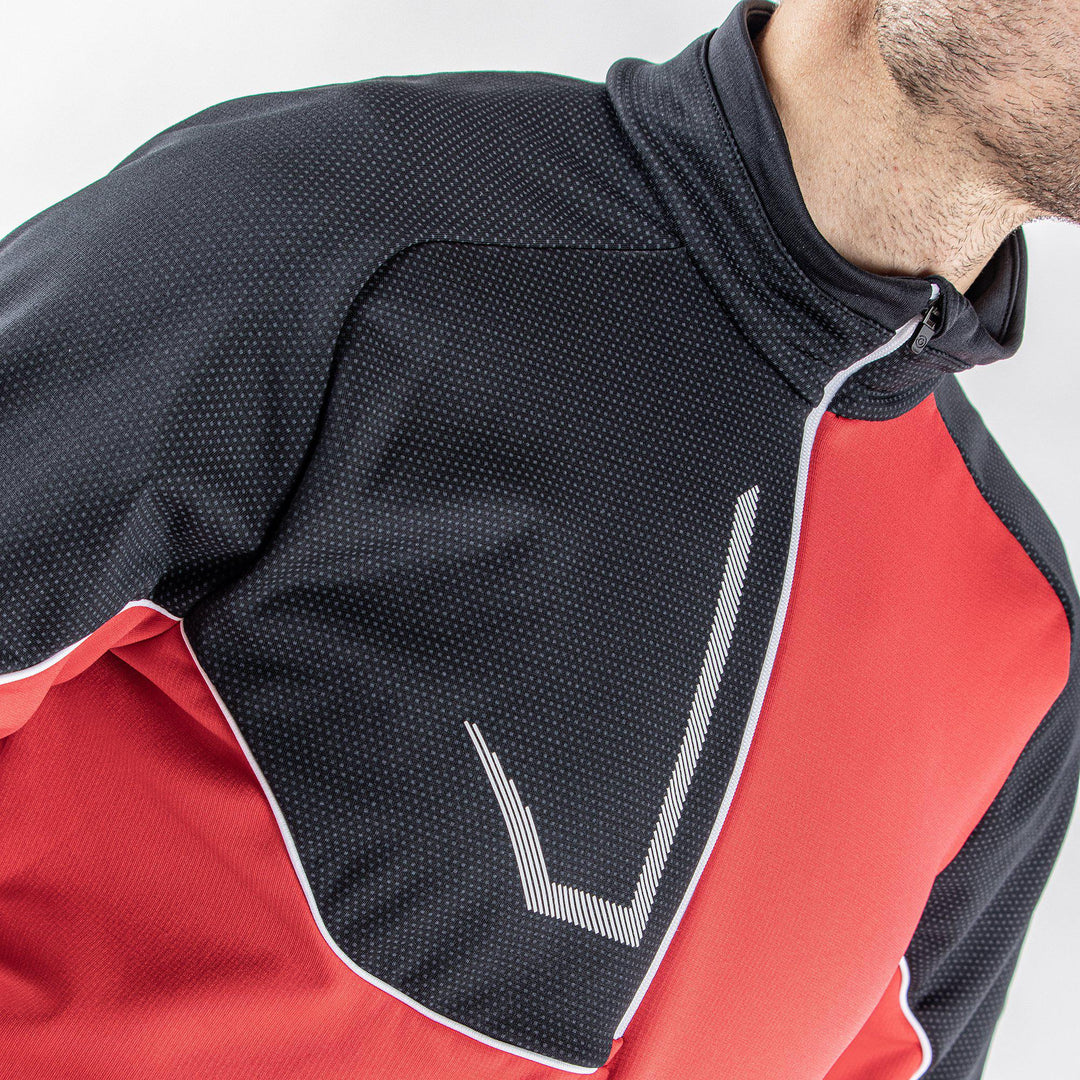 Daxton is a Insulating golf mid layer for Men in the color Red(4)
