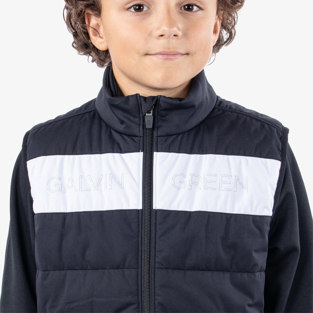 Ronie is a Windproof and water repellent golf vest for Juniors in the color Black/White(5)