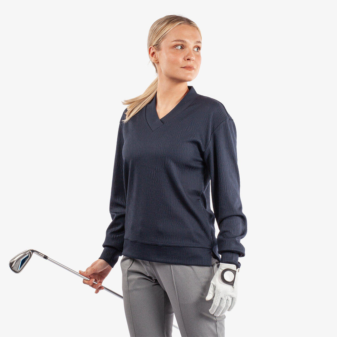 Donya is a Insulating golf mid layer for Women in the color Navy(1)