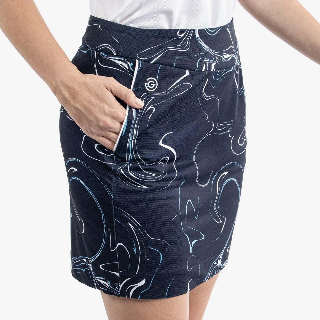 Mabel is a Breathable golf skirt with inner shorts for Women in the color Navy/White/Blue Bell(3)