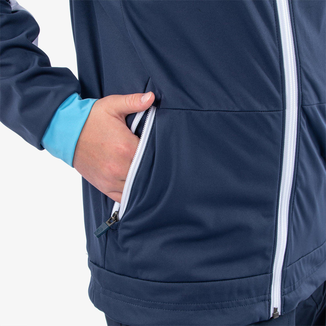 Remi is a Windproof and water repellent golf jacket for Juniors in the color Navy/Alaskan Blue/Wh(5)