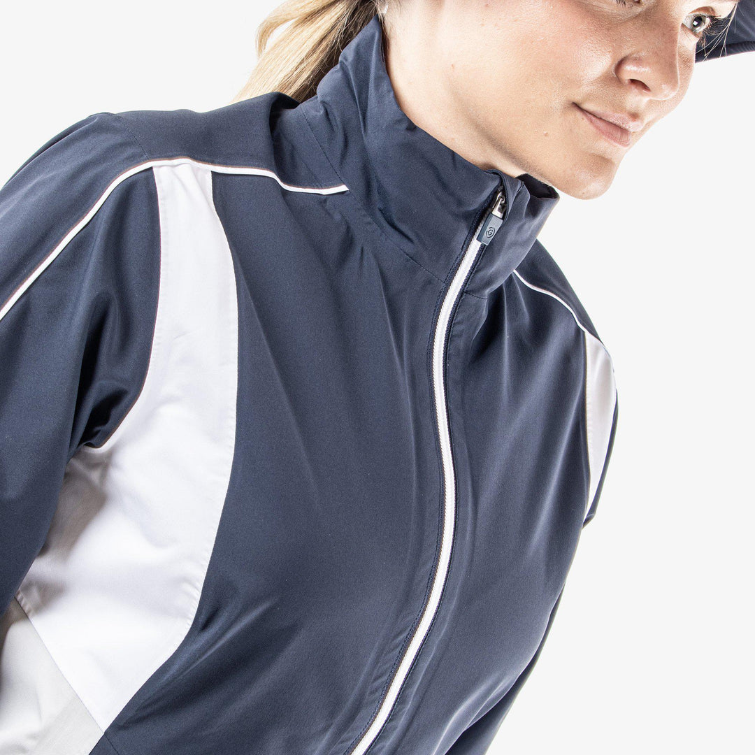 Ally is a Waterproof Jacket for Women in the color Navy/Cool Grey/White(3)