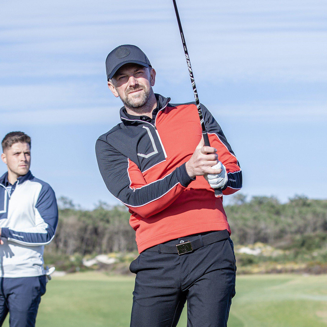 Daxton is a Insulating golf mid layer for Men in the color Red(2)