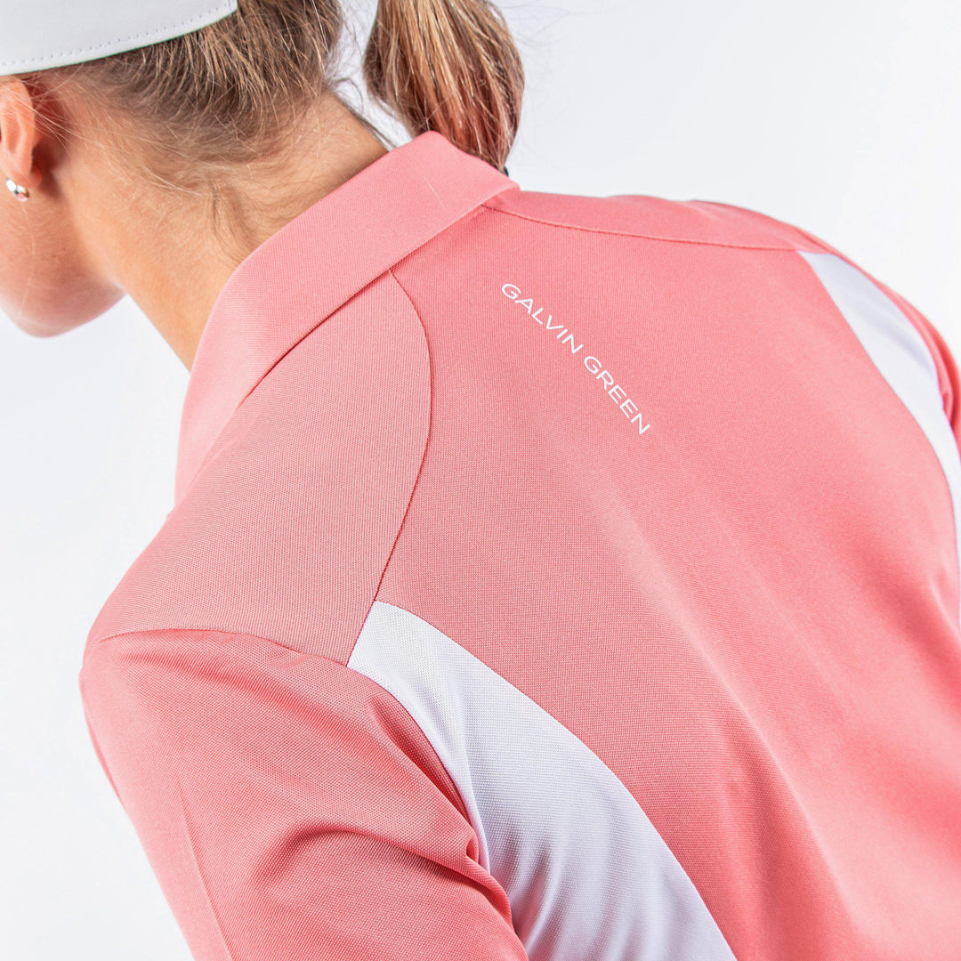 Melanie is a Breathable short sleeve golf shirt for Women in the color Coral/White/Cool Grey(6)