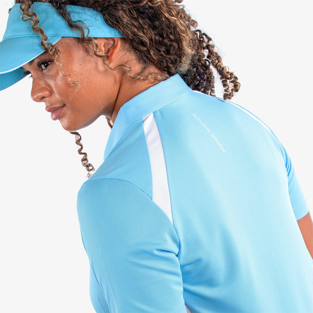 Mirelle is a Breathable short sleeve golf shirt for Women in the color Alaskan Blue/White(5)