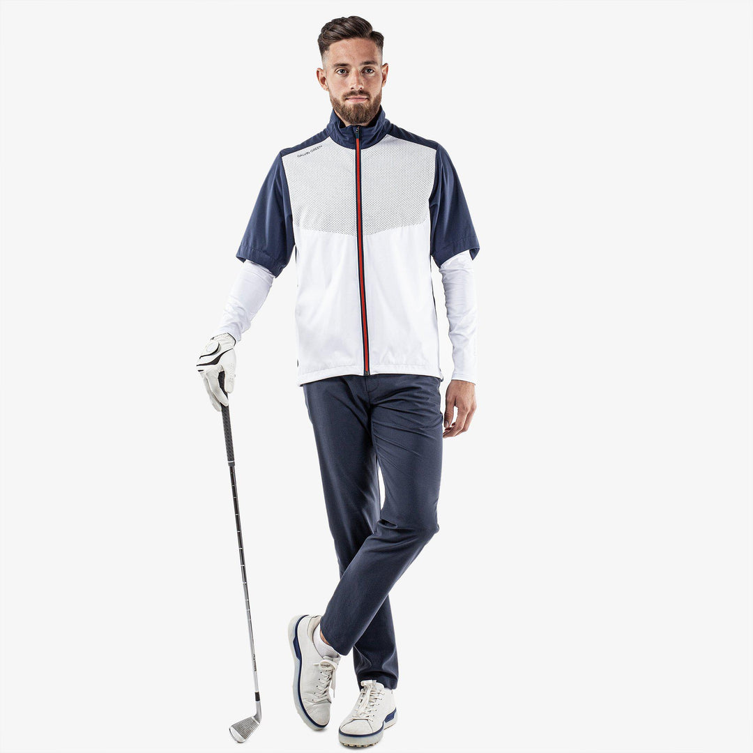 Livingston is a Windproof and water repellent golf jacket for Men in the color White/Navy/Orange(2)