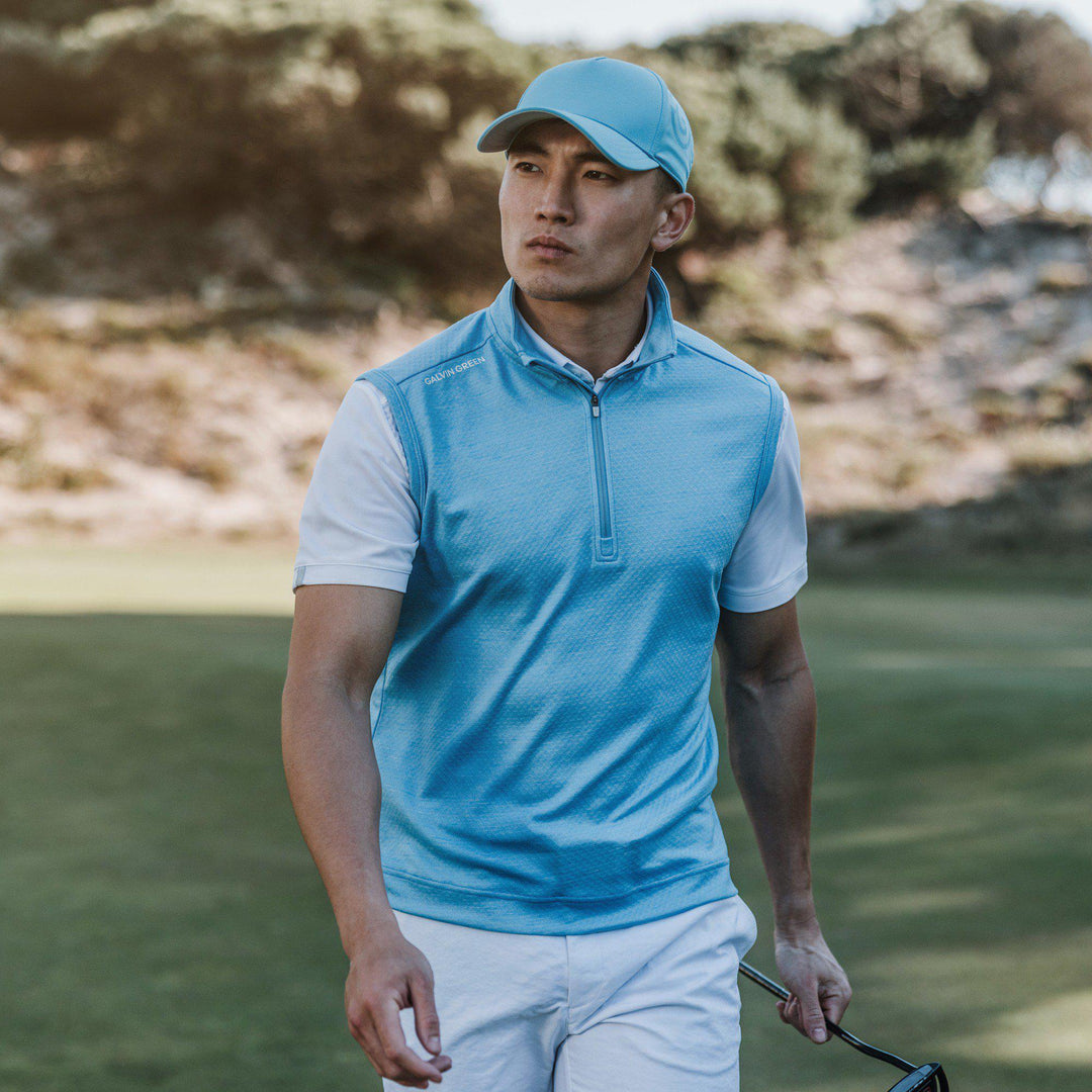 Del is a Insulating golf vest for Men in the color Alaskan Blue Melange(8)