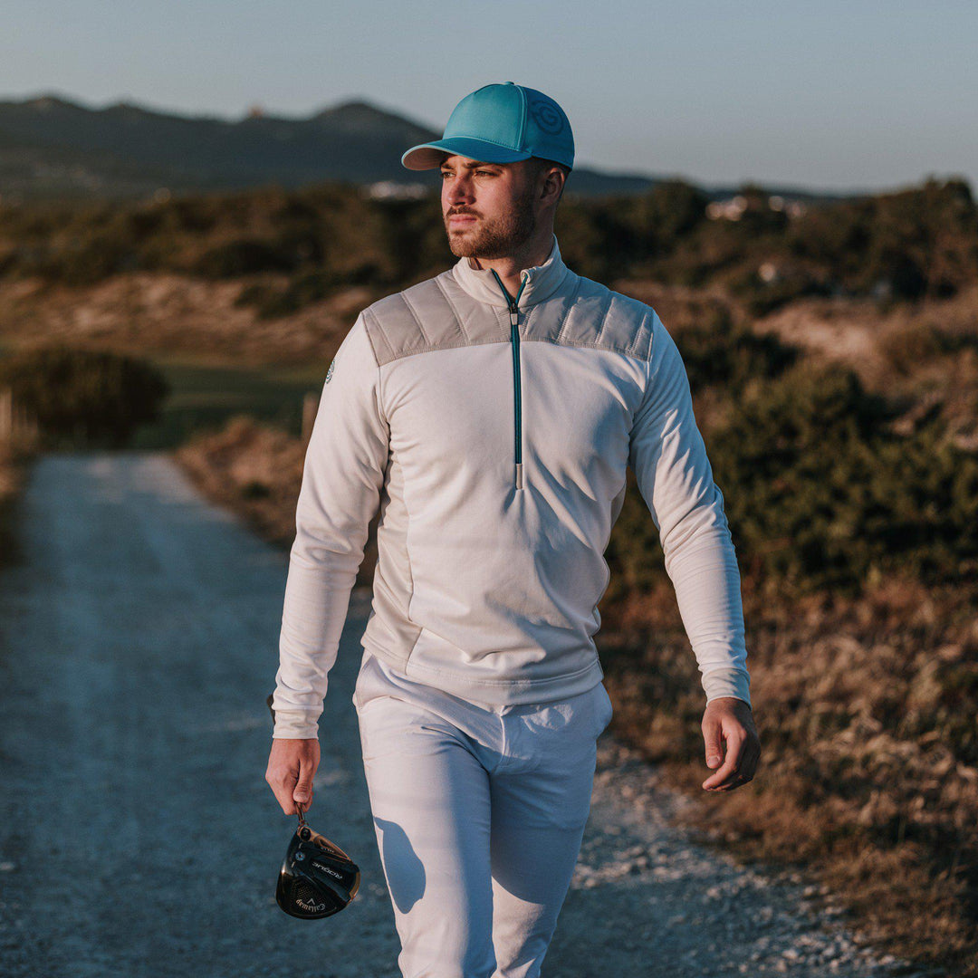 Durante is a Insulating golf mid layer for Men in the color White/Cool Grey/Aqua(8)