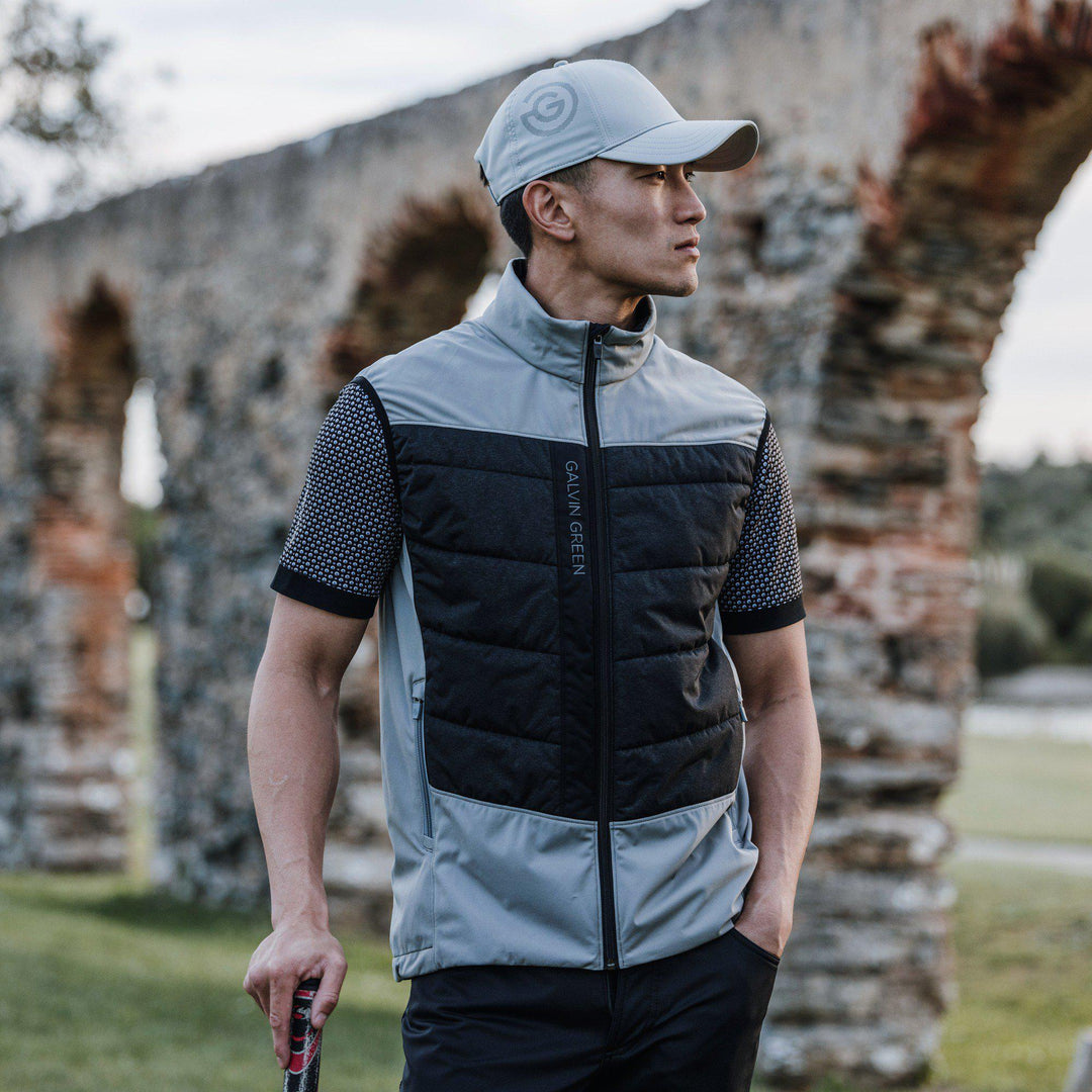 Lauro is a Windproof and water repellent golf vest for Men in the color Sharkskin/Black(9)