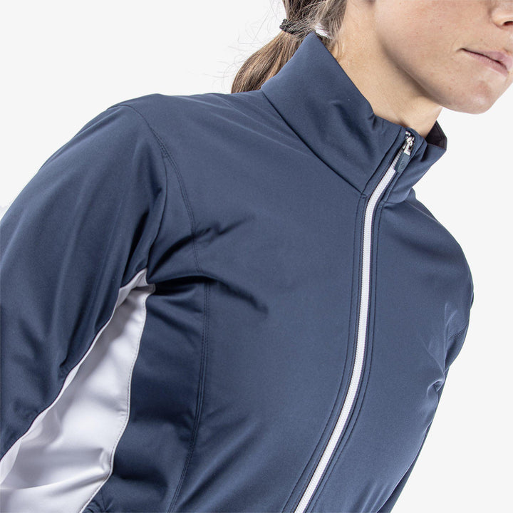 Larissa is a Windproof and water repellent golf jacket for Women in the color Navy/White(4)