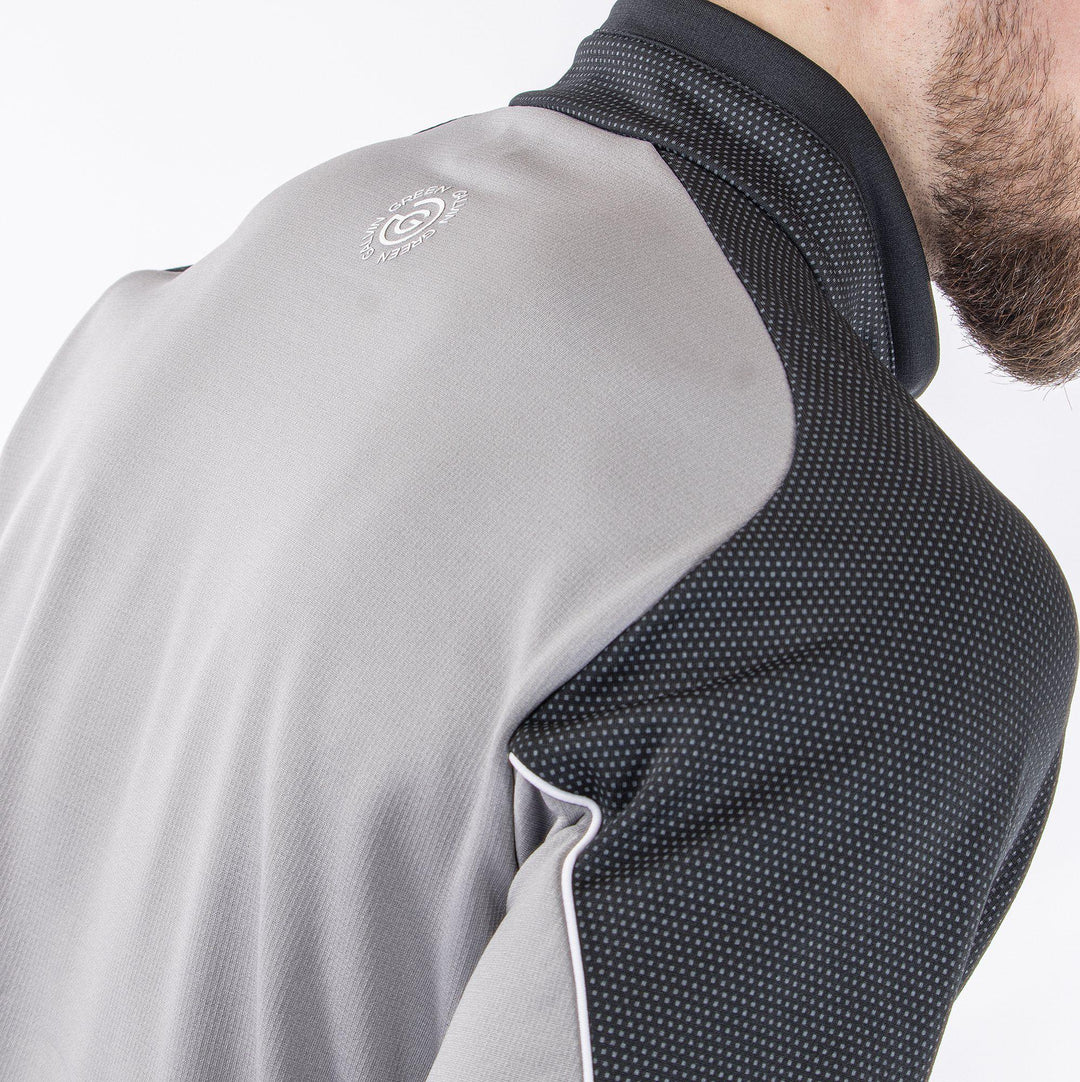 Daxton is a Insulating golf mid layer for Men in the color Fantastic Black(7)