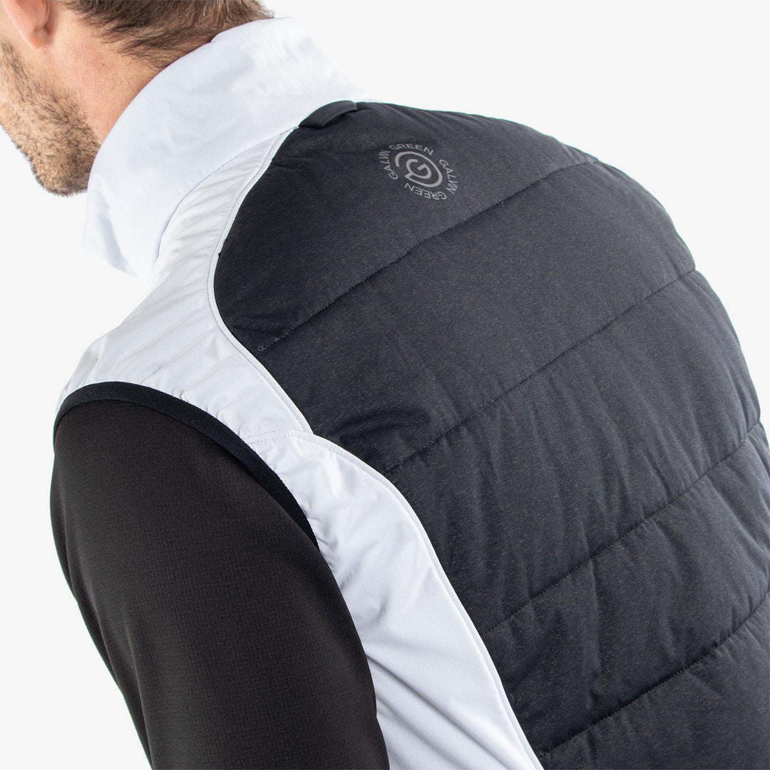 Lauro is a Windproof and water repellent golf vest for Men in the color White/Black(6)