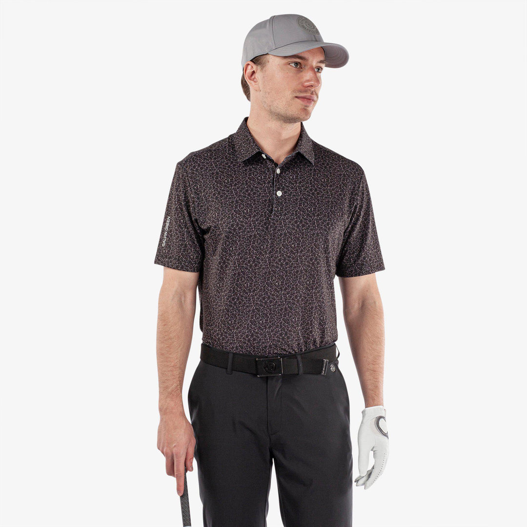 Mani is a Breathable short sleeve golf shirt for Men in the color Black(1)