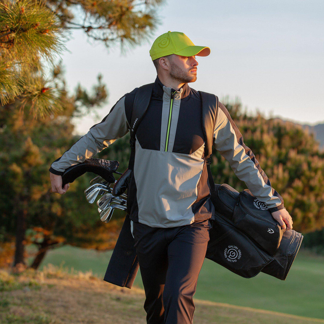 Lawrence is a Windproof and water repellent golf jacket for Men in the color Sharkskin/Black/Sunny Lime(8)