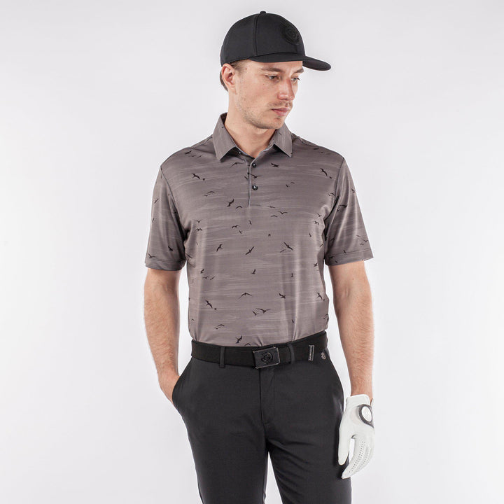 Marin is a Breathable short sleeve golf shirt for Men in the color Forged Iron/Black (1)