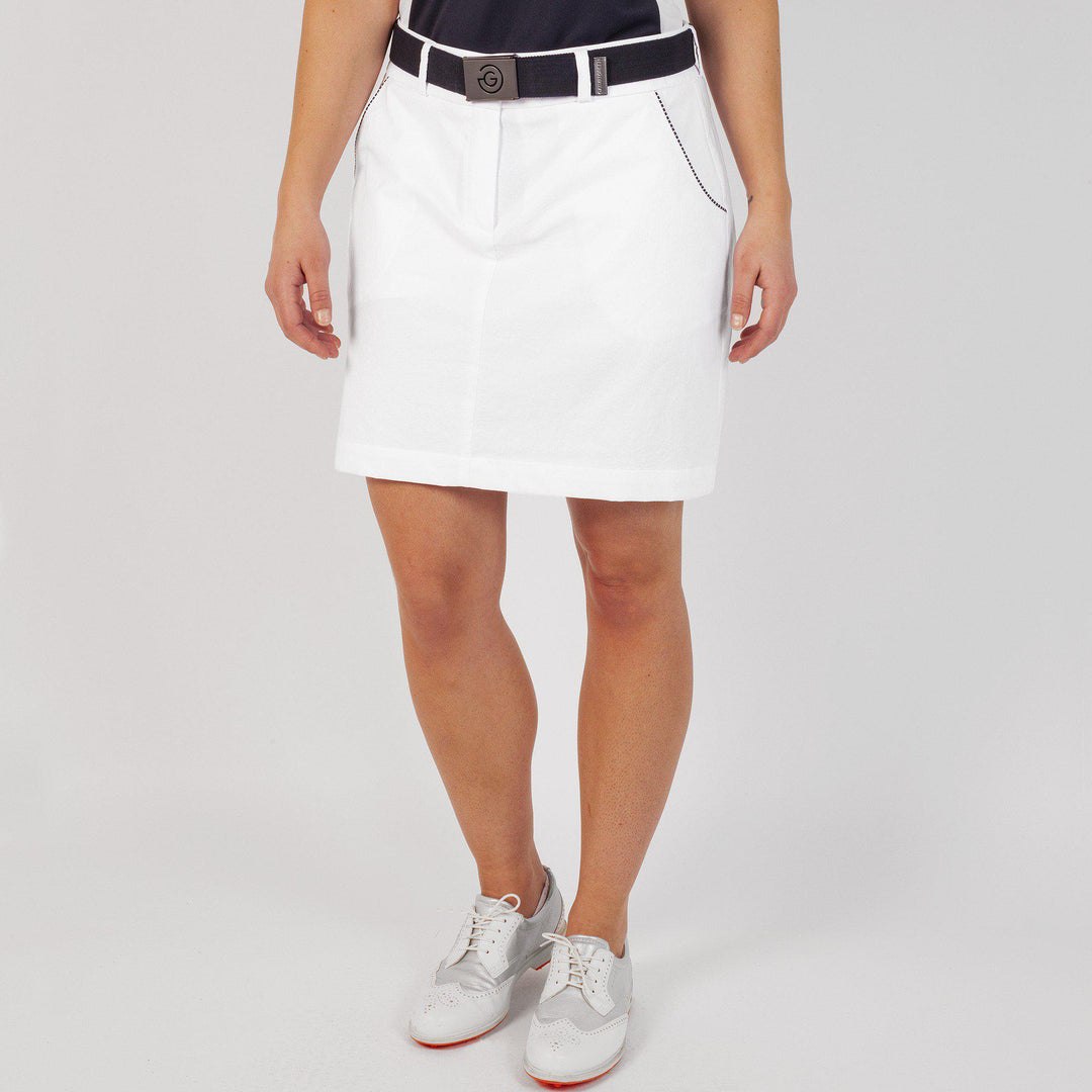 Nikki is a Breathable skirt with inner shorts for Women in the color White(1)