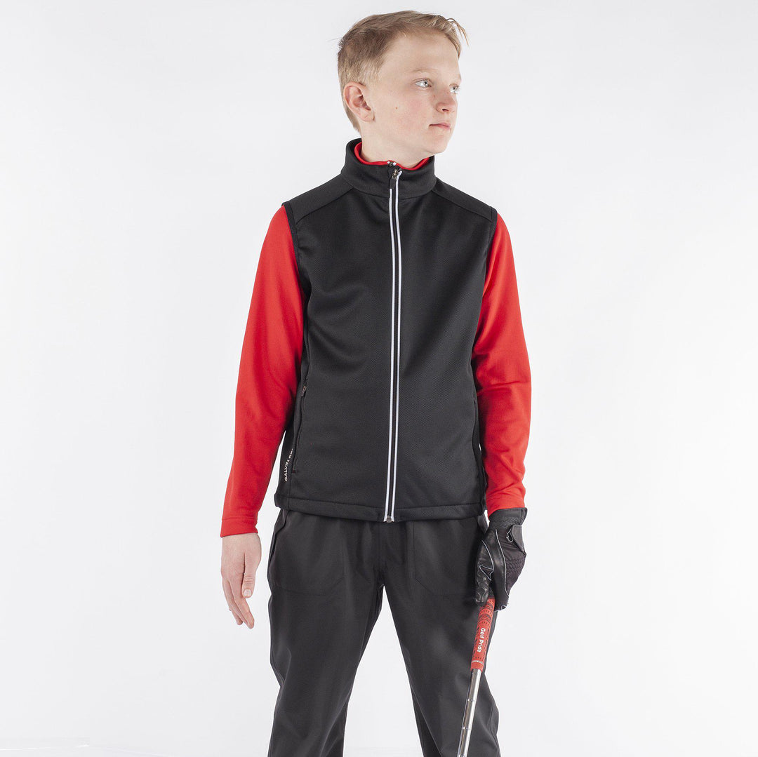 Rio is a Windproof and water repellent golf vest for Juniors in the color Black(1)