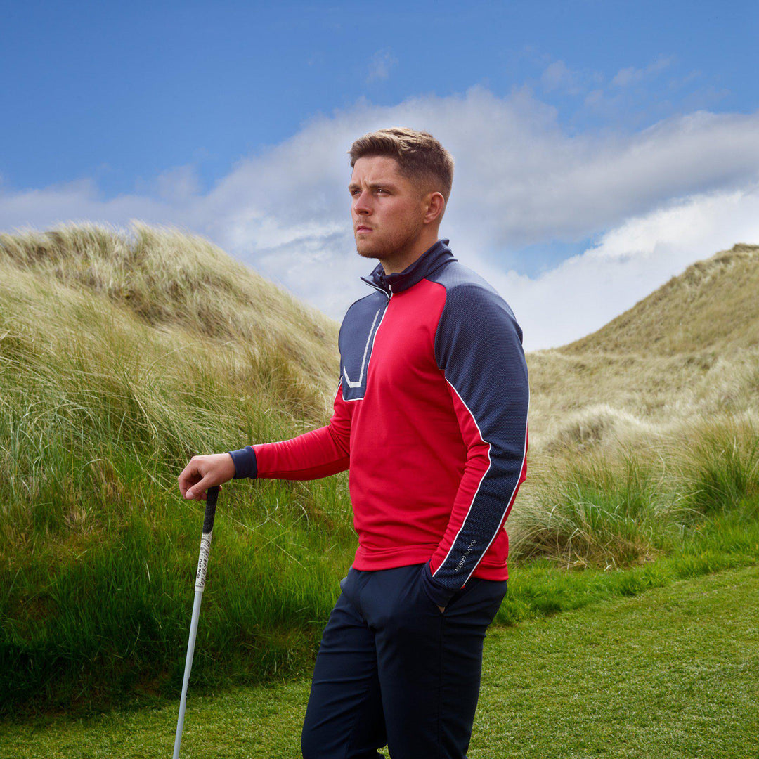 Daxton is a Insulating golf mid layer for Men in the color Sporty Red(2)