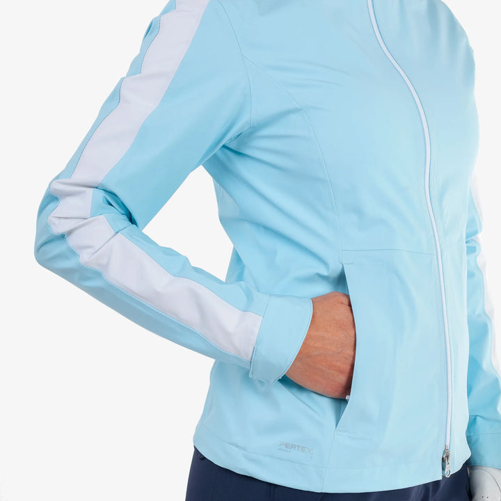 Abby is a Waterproof golf jacket for Women in the color Crystal Blue/White(4)