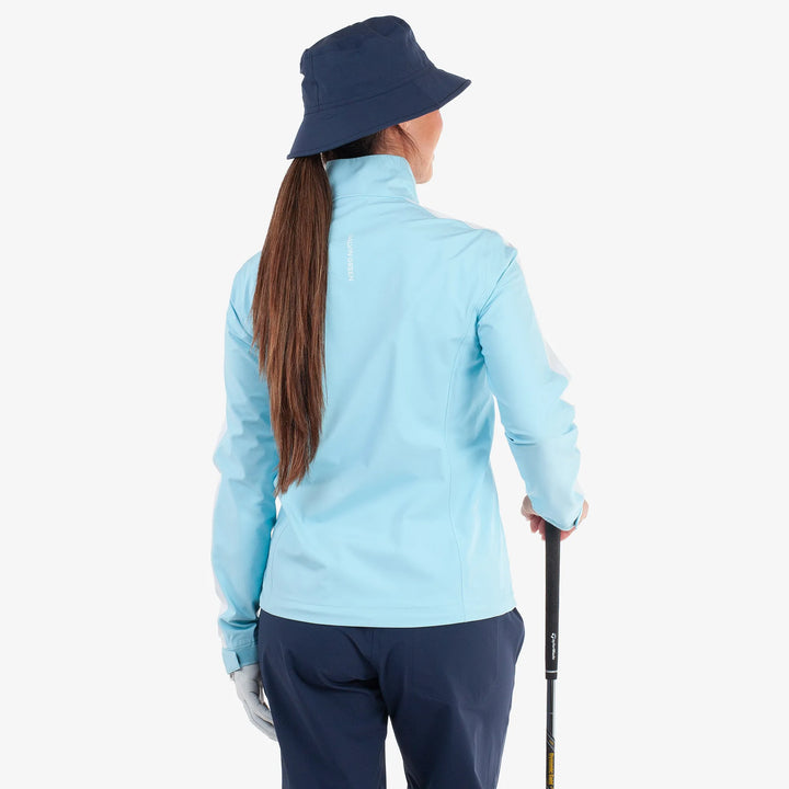Abby is a Waterproof golf jacket for Women in the color Crystal Blue/White(5)