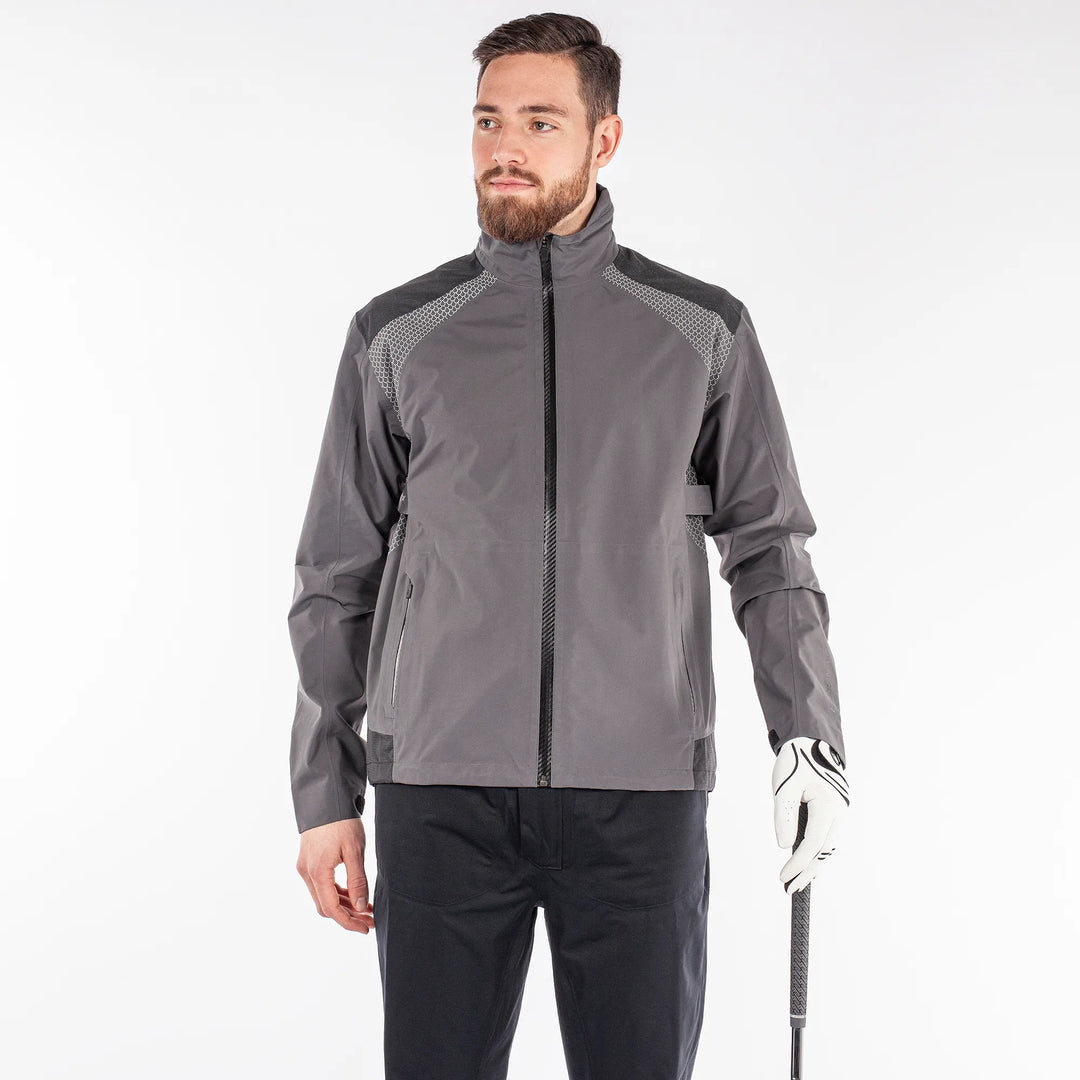 Action is a Waterproof golf jacket for Men in the color Forged Iron(1)