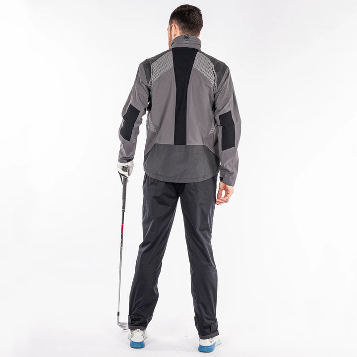 Action is a Waterproof golf jacket for Men in the color Forged Iron(7)