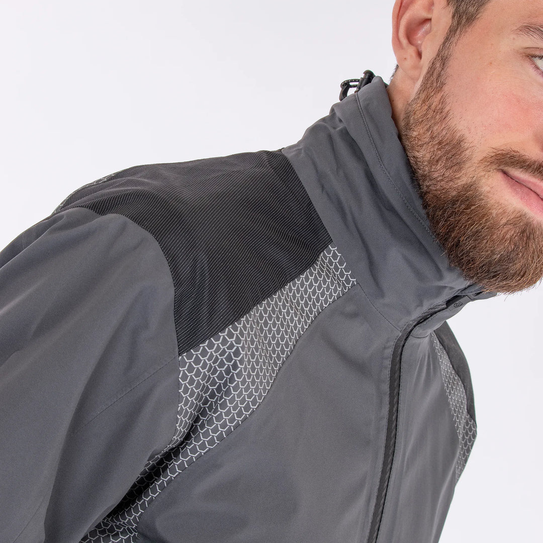 Action is a Waterproof golf jacket for Men in the color Forged Iron(3)