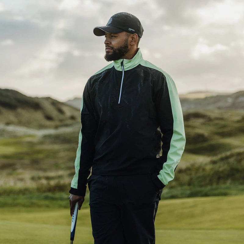 Adam is a Waterproof Golf Jacket for Men in the color Black/Fresh Green(9)