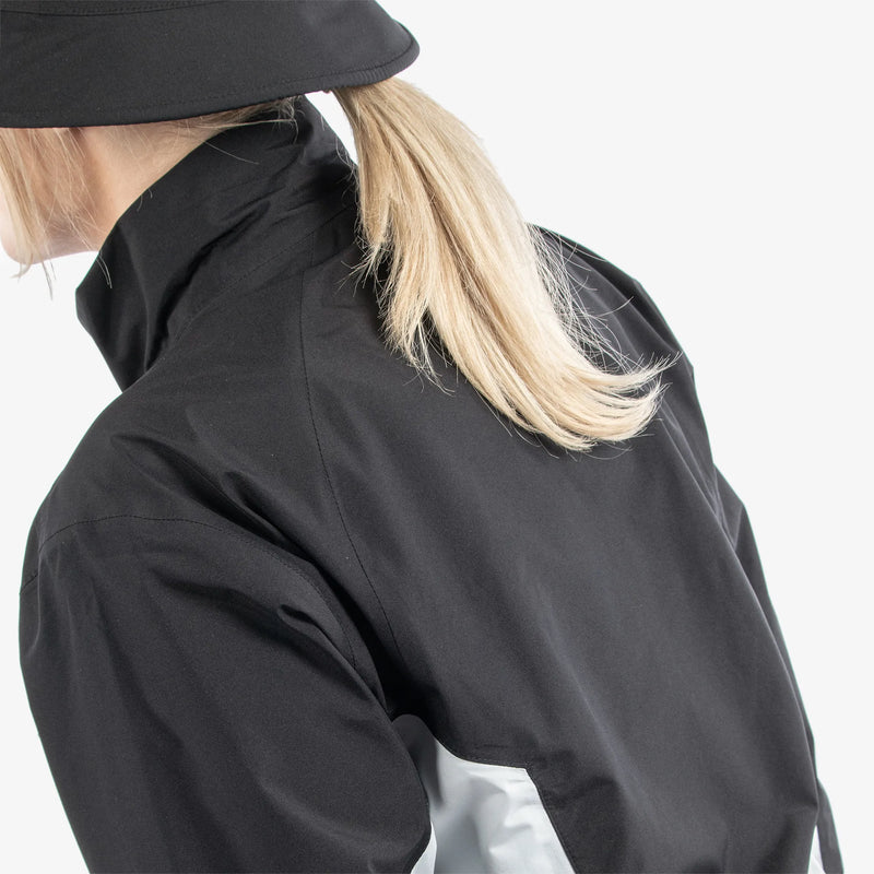 Aida is a Waterproof golf jacket for Women in the color Black/Cool Grey/White(8)