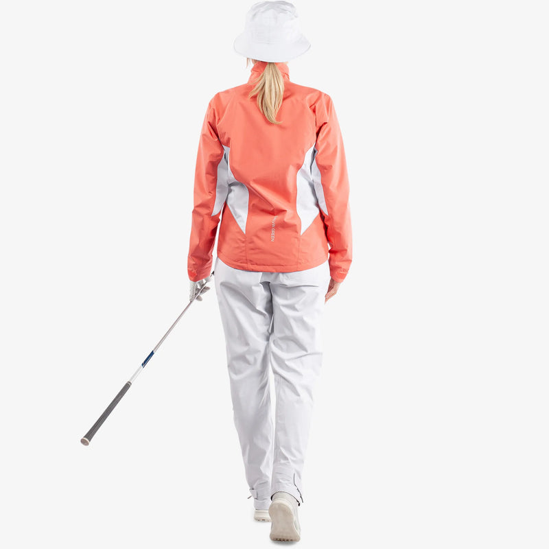 Aida is a Waterproof golf jacket for Women in the color Coral/White/Cool Grey(9)