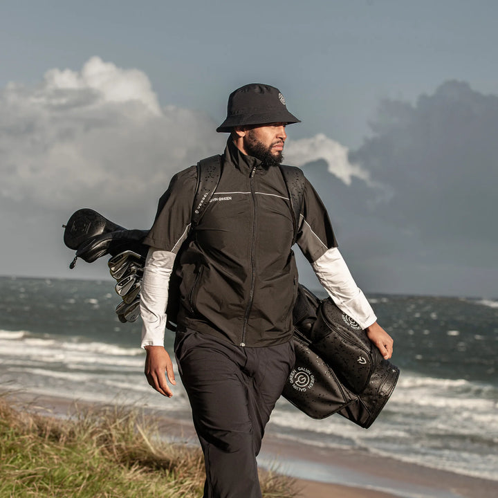 Air is a Waterproof short sleeve golf jacket for Men in the color Black/Forged Iron(10)