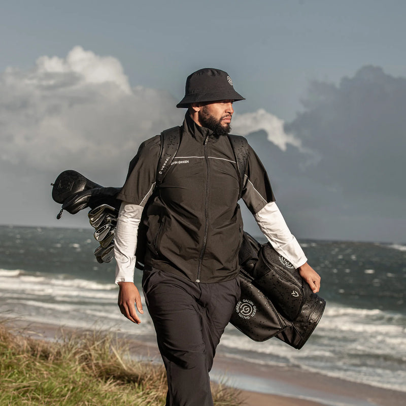 Air is a Waterproof short sleeve golf jacket for Men in the color Black/Forged Iron(10)