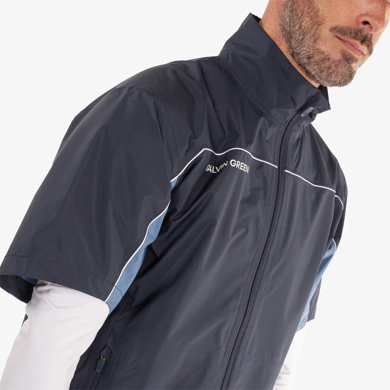 Air is a Waterproof short sleeve golf jacket for Men in the color Navy/Moonlight Blue(3)