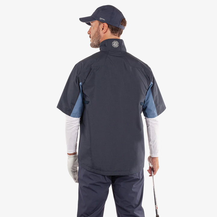 Air is a Waterproof short sleeve golf jacket for Men in the color Navy/Moonlight Blue(5)