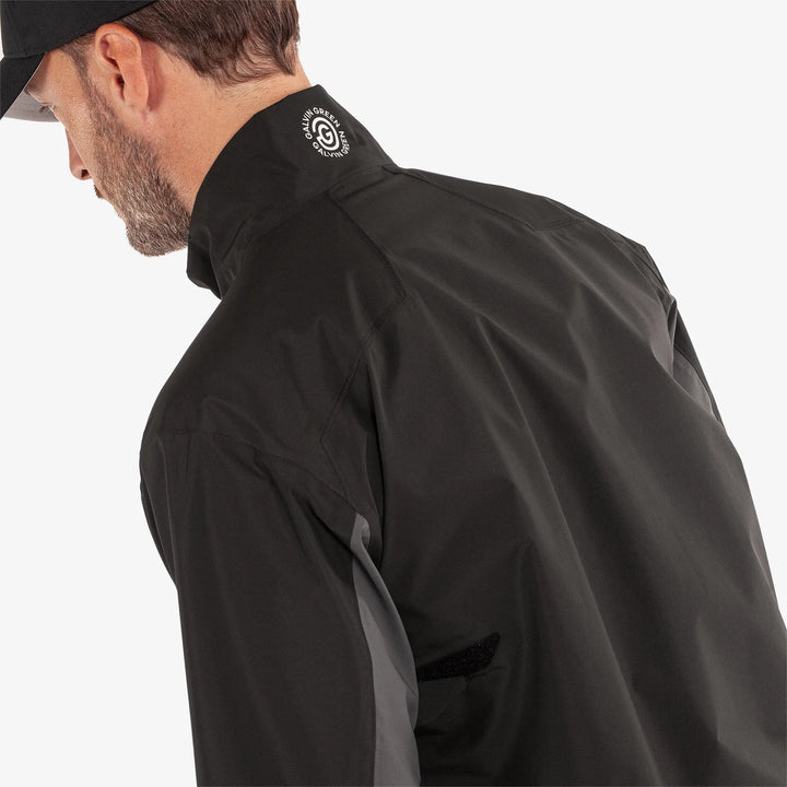 Air is a Waterproof short sleeve golf jacket for Men in the color Black/Forged Iron(6)
