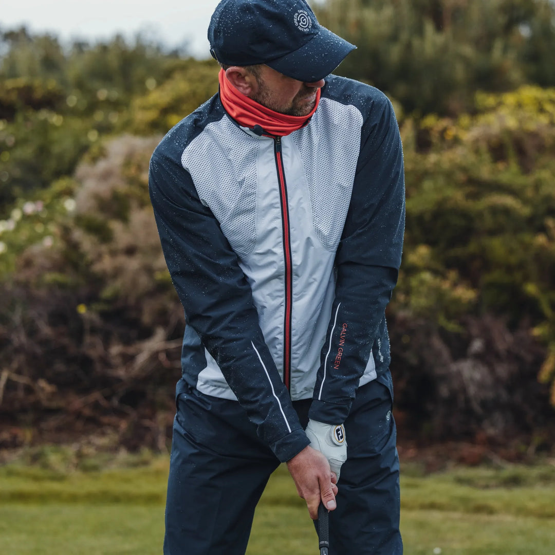 Albert is a Waterproof golf jacket for Men in the color White/Navy/Orange(10)