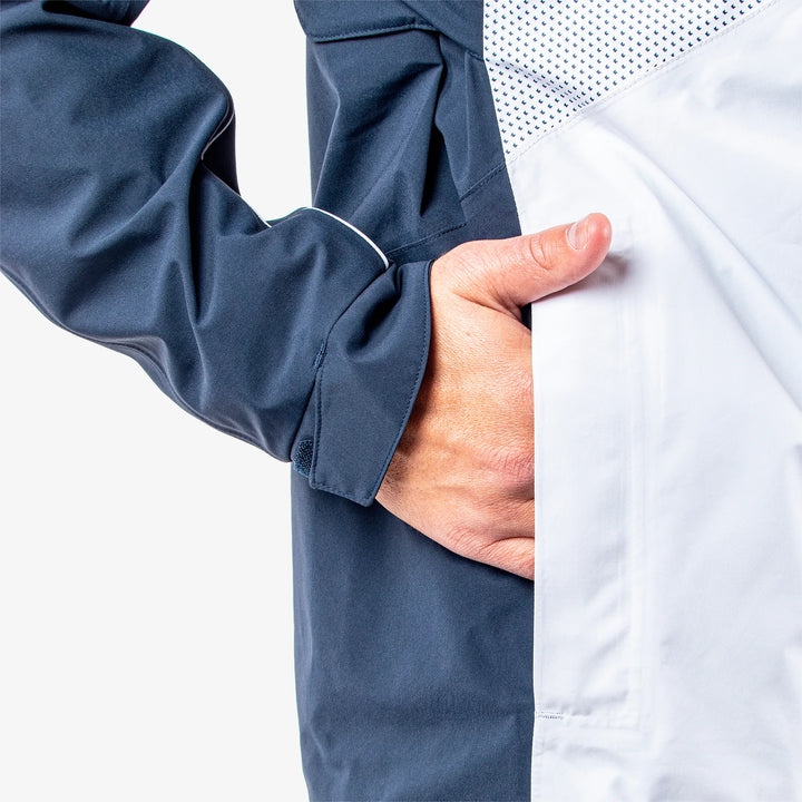 Albert is a Waterproof golf jacket for Men in the color White/Navy/Orange(4)