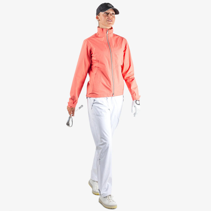 Alice is a Waterproof golf jacket for Women in the color Sugar Coral(2)