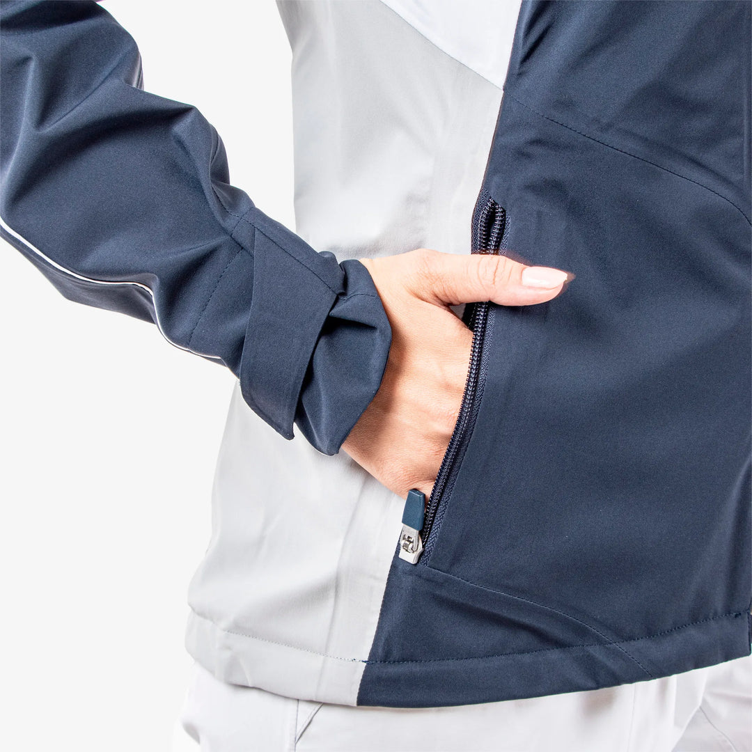 Ally is a Waterproof golf jacket for Women in the color Navy/Cool Grey/White(4)