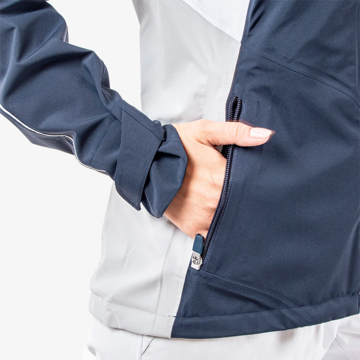 Ally is a Waterproof golf jacket for Women in the color Navy/Cool Grey/White(4)
