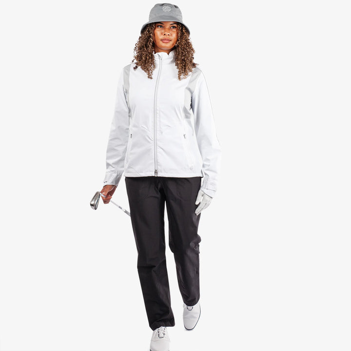 Ally is a Waterproof golf jacket for Women in the color White/Cool Grey(2)
