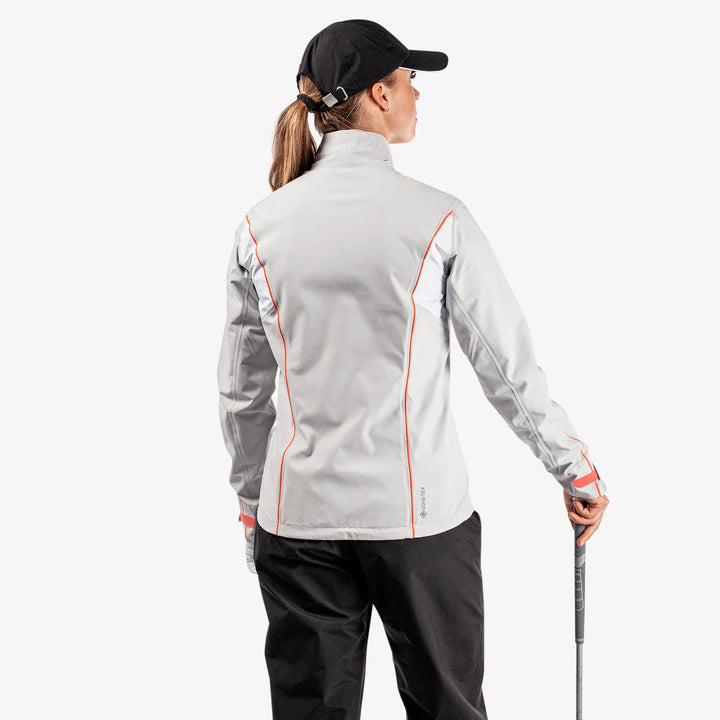 Ally is a Waterproof golf jacket for Women in the color Cool Grey/White/Coral(5)